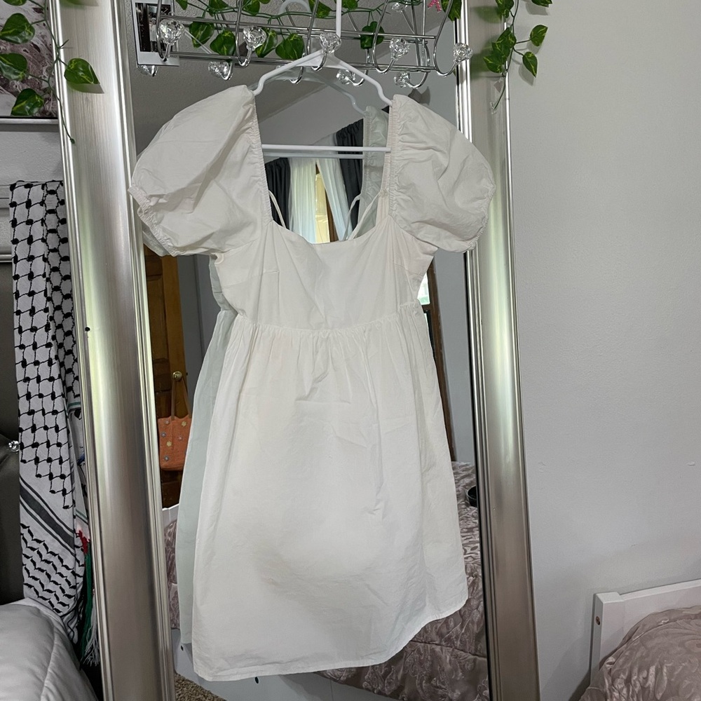 white dress with puffy sleeves